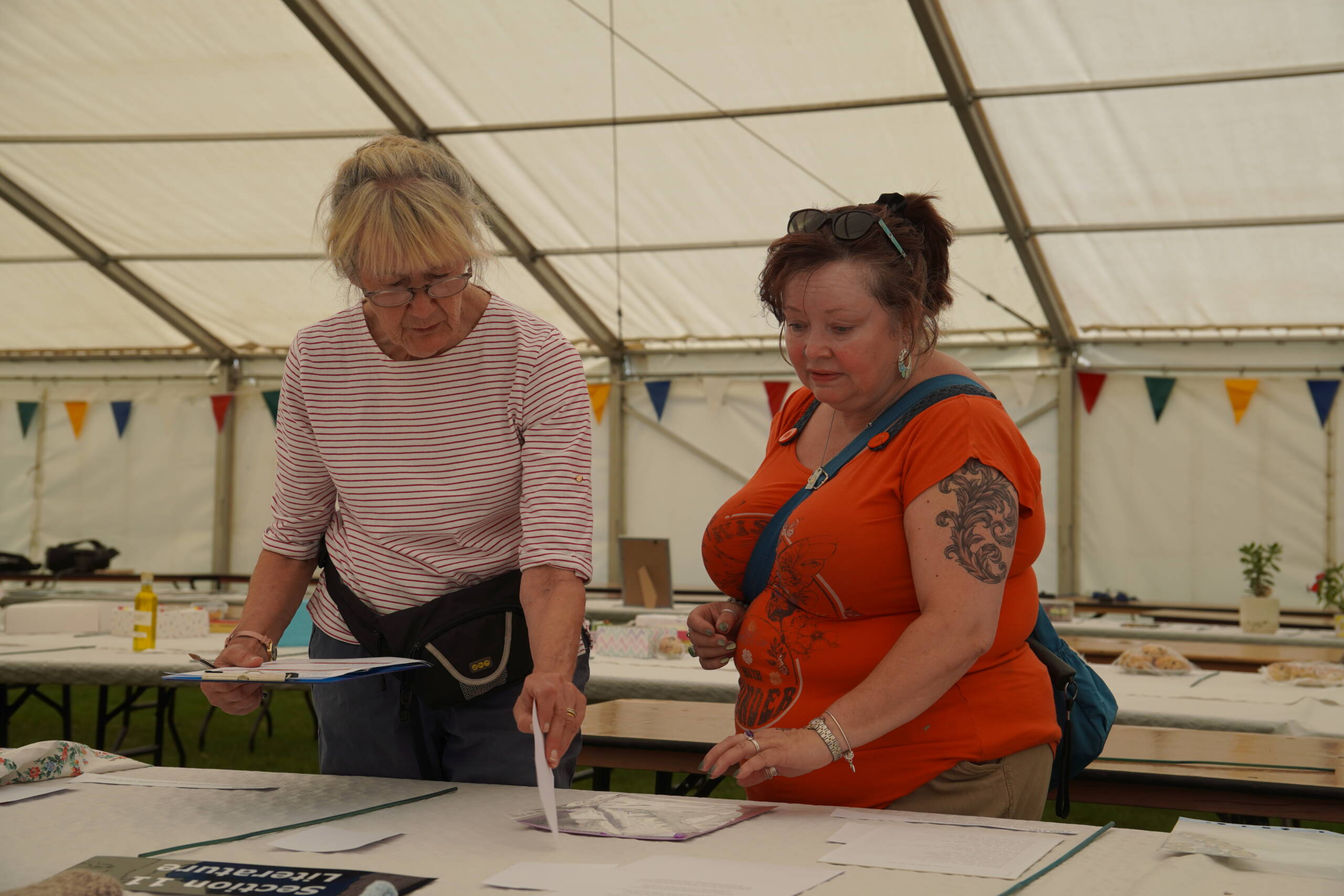 Judge and helper judging the literature section