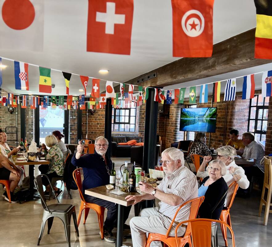 Worcester Language Exchange seated around a table